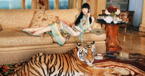 Photo shows an ad from Gucci's latest campaign centered around the Year of the Tiger. The campaign features a live tiger.